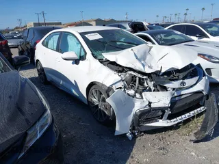 2021 Toyota Corolla SE with VIN 5YFS4MCE9MP084276, listed as a IAAI auction lot 42056696 with 39,544 mi miles and . Bid and sale history available at carsss.com. Image 1.