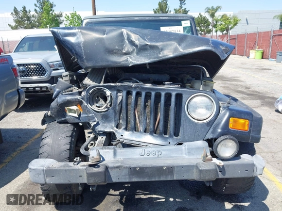 2001 Jeep Wrangler Sahara with VIN 1J4FA59SX1P337951, listed as a IAAI auction lot 42087134 with 154,479 mi miles and . Bid and sale history available at DreamBid. Image 12.