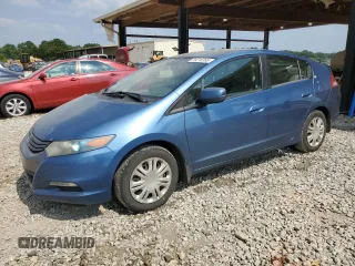 2010 Honda Insight LX with VIN JHMZE2H50AS017017, listed as a Copart auction lot 59216365 with 216,707 mi miles and Salvage title. Bid and sale history available at DreamBid. Image 1.