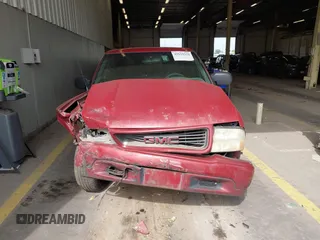 2001 GMC Sonoma SLS 1SG z VIN 1GTCS19W818224334, wystawiony jako IAAI lot #42119324 z przebiegiem 209 663 mil mil oraz . Historia ofert i sprzedaży dostępna na DreamBid. Obrazek 11.