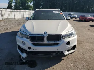 2014 BMW X5 xDrive50i z VIN 5UXKR6C57E0C03114, wystawiony jako Copart lot #57940175 z przebiegiem 165 249 mil mil oraz Czysty tytuł • Clean title. Historia ofert i sprzedaży dostępna na DreamBid. Obrazek 5.