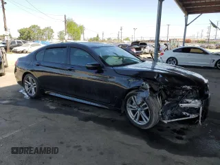 2016 BMW 7 Series 740i z VIN WBA7E2C55GG547282, wystawiony jako Copart lot #57740095 z przebiegiem Nie podano mil oraz Szkoda całkowita • Salvage title. Historia ofert i sprzedaży dostępna na DreamBid. Obrazek 4.
