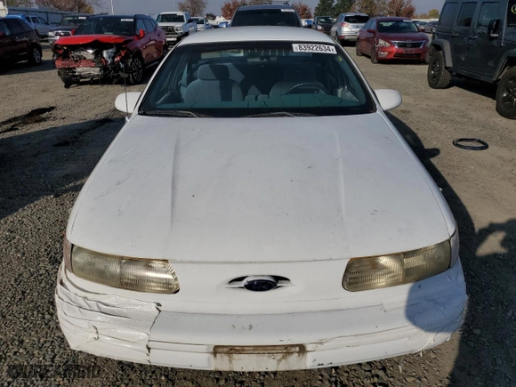 1993 Ford Taurus GL with VIN 1FALP5247PG143248, listed as a Copart auction lot 83922634 with 605,096 mi miles and Salvage Title. Bid and sale history available at carsss.com. Image 5.