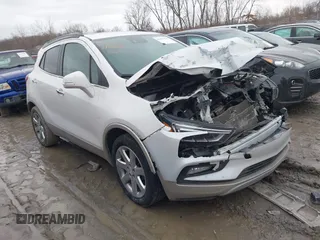2019 Buick Encore Essence with VIN KL4CJCSM2KB734927, listed as a IAAI auction lot 41470478 with 137,459 mi miles. Bid and sale history available at carsss.com. Image 1.