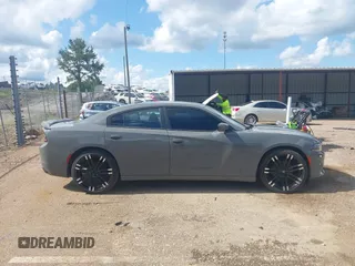 2017 Dodge Charger SXT z VIN 2C3CDXHG4HH523450, wystawiony jako IAAI lot #42385047 z przebiegiem 162 302 mil mil oraz . Historia ofert i sprzedaży dostępna na DreamBid. Obrazek 13.
