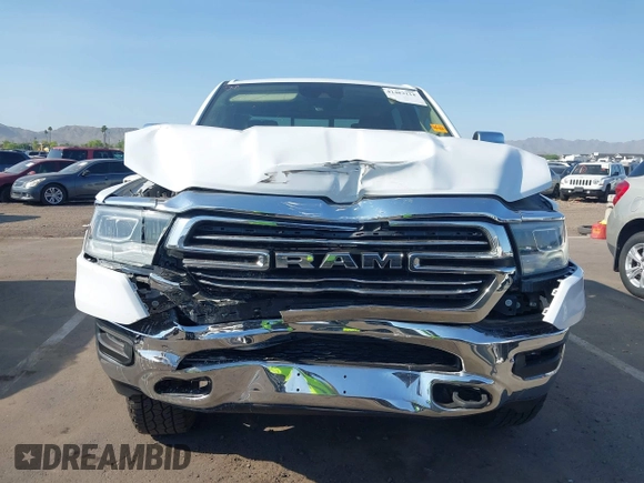 2021 Ram 1500 Laramie with VIN 1C6SRFJT7MN719238, listed as a IAAI auction lot 42482214 with 47,265 mi miles and . Bid and sale history available at DreamBid. Image 6.