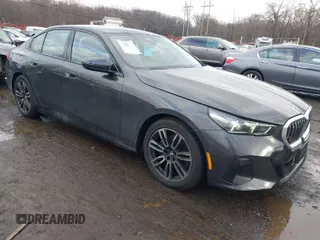 2025 BMW 5 Series 530i xDrive with VIN WBA53FJ01SCT82794, listed as a IAAI auction lot 41575089 with 2,806 mi miles. Bid and sale history available at carsss.com. Image 1.