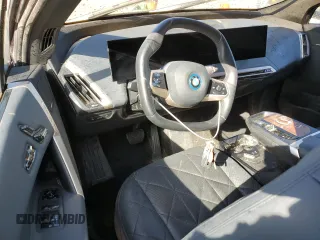 2023 BMW iX xDrive50 with VIN WB523CF0XPCM89410, listed as a Copart auction lot 75018924 with 0 mi miles and Non Repairable. Bid and sale history available at carsss.com. Image 8.