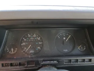 1991 Plymouth Sundance z VIN 1P3XP24D6MN564571, wystawiony jako Copart lot #78415044 z przebiegiem 50 625 mil mil oraz Tytuł czysty. Historia ofert i sprzedaży dostępna na DreamBid. Obrazek 9.