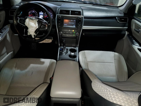 2015 Toyota Camry XLE with VIN 4T1BF1FK3FU077674, listed as a Copart auction lot 52679985 with 128,417 mi miles and Salvage Title. Bid and sale history available at DreamBid. Image 8.
