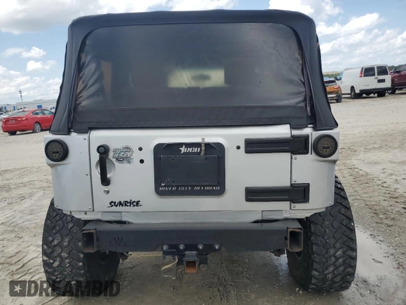 2008 Jeep Wrangler X with VIN 1J4FA24168L549082, listed as a Copart auction lot 58178805 with 150,606 mi miles and Salvage title. Bid and sale history available at DreamBid. Image 6.