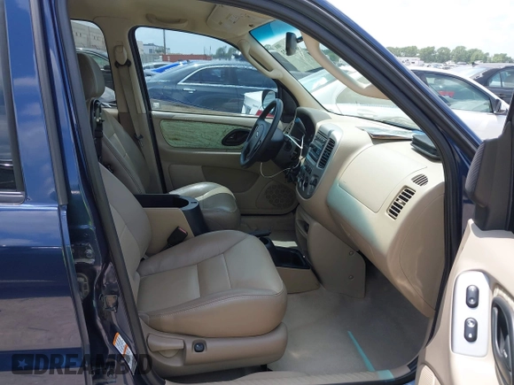 2003 Ford Escape Limited z VIN 1FMCU94163KA63424, wystawiony jako IAAI lot #42737023 z przebiegiem 137 918 mil mil oraz . Historia ofert i sprzedaży dostępna na DreamBid. Obrazek 5.
