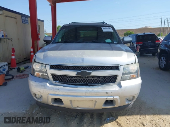 2013 Chevrolet Tahoe LT z VIN 1GNSCBE04DR238222, wystawiony jako IAAI lot #42228643 z przebiegiem 214 525 mil mil oraz . Historia ofert i sprzedaży dostępna na DreamBid. Obrazek 12.