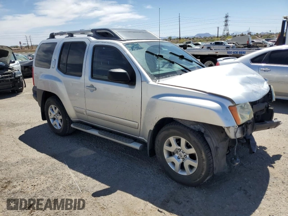 2010 Nissan Xterra S with VIN 5N1AN0NU2AC519838, listed as a Copart auction lot 57301355 with 129,990 mi miles and Salvage title. Bid and sale history available at DreamBid. Image 4.