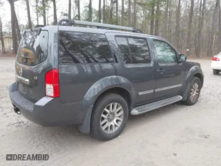 2010 Nissan Pathfinder SE with VIN 5N1AR1NB4AC627788, listed as a IAAI auction lot 41733257 with 130,586 mi miles. Bid and sale history available at carsss.com. Image 4.