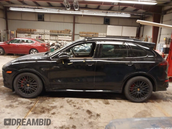 2016 Porsche Cayenne GTS z VIN WP1AD2A29GLA72438, wystawiony jako IAAI lot #41279805 z przebiegiem 29 769 mil mil oraz . Historia ofert i sprzedaży dostępna na DreamBid. Obrazek 14.