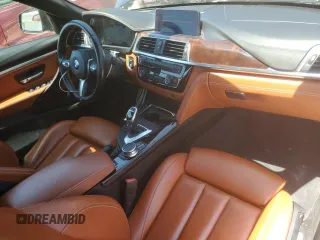 2018 BMW 4 Series 440i z VIN WBA4Z5C5XJEE16508, wystawiony jako Copart lot #52080845 z przebiegiem 57 184 mil mil oraz Szkoda całkowita • Salvage title. Historia ofert i sprzedaży dostępna na DreamBid. Obrazek 8.