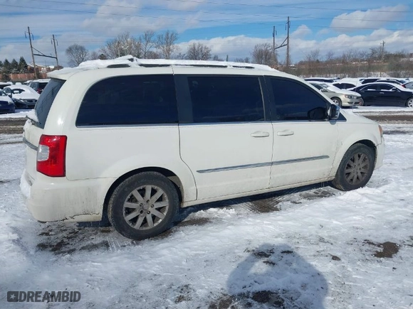 2012 Chrysler Town & Country Touring-L with VIN 2C4RC1CG5CR125275, listed as a IAAI auction lot 41376571 with 215,256 mi miles. Bid and sale history available at carsss.com. Image 4.