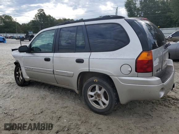 2004 GMC Envoy SLE with VIN 1GKDS13S142309781, listed as a Copart auction lot 73502854 with 349,449 mi miles and Salvage Title. Bid and sale history available at carsss.com. Image 2.
