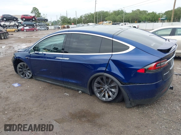2018 Tesla Model X 75D with VIN 5YJXCAE2XJF111180, listed as a IAAI auction lot 41988079 with 114,593 mi miles and . Bid and sale history available at DreamBid. Image 14.