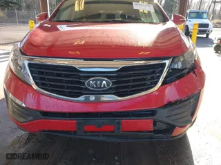 2012 Kia Sportage LX with VIN KNDPBCA24C7229772, listed as a IAAI auction lot 41881555 with 176,589 mi miles. Bid and sale history available at carsss.com. Image 6.