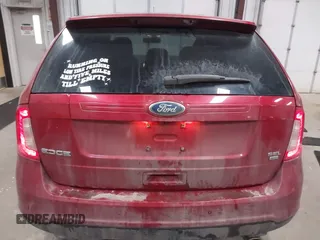 2011 Ford Edge SEL with VIN 2FMDK4JC4BBA38257, listed as a IAAI auction lot 41216860 with 148,351 mi miles. Bid and sale history available at carsss.com. Image 16.