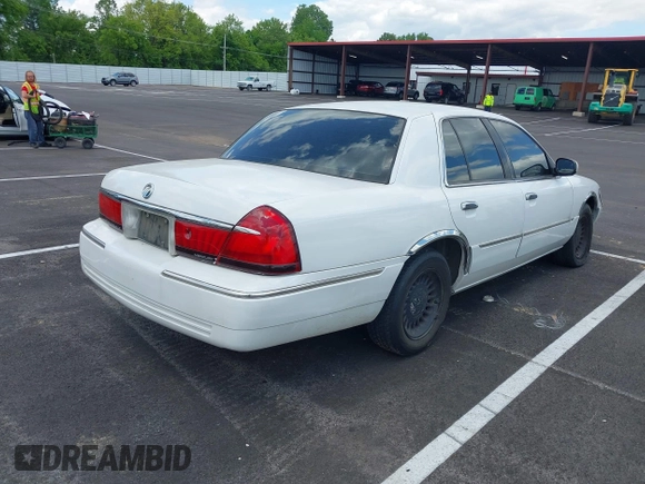 2001 Mercury Grand Marquis LS with VIN 2MEFM75W71X614856, listed as a IAAI auction lot 42195921 with 113,352 mi miles and . Bid and sale history available at DreamBid. Image 4.