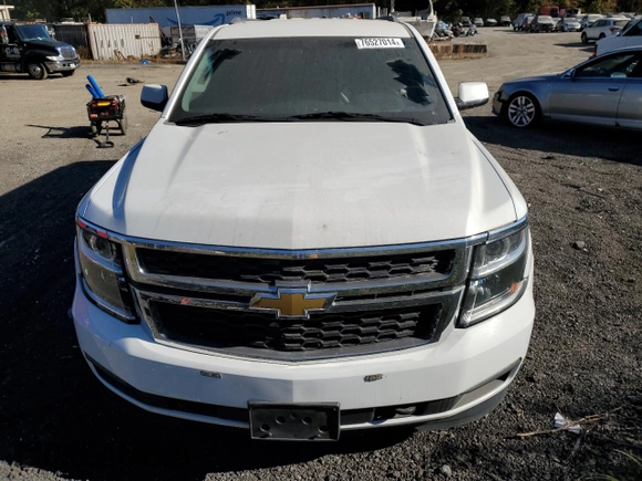 2020 Chevrolet Suburban Commercial with VIN 1GNSKKEC4LR213767, listed as a Copart auction lot 76527014 with 142,132 mi miles and Clean Title. Bid and sale history available at carsss.com. Image 5.