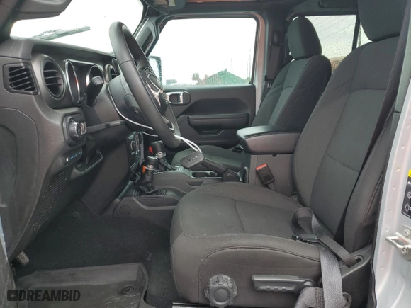 2023 Jeep Wrangler 4xe with VIN 1C4JJXN65PW661358, listed as a Copart auction lot 52500645 with 39,667 mi miles and Clean Title. Bid and sale history available at carsss.com. Image 7.