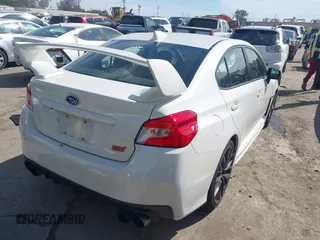 2019 Subaru WRX STI with VIN JF1VA2R60K9819293, listed as a IAAI auction lot 41758745 with 42,101 mi miles and . Bid and sale history available at DreamBid. Image 4.