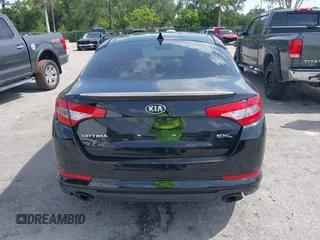 2013 Kia Optima SX with VIN 5XXGR4A61DG100479, listed as a IAAI auction lot 42376261 with 201,615 mi miles and . Bid and sale history available at DreamBid. Image 16.