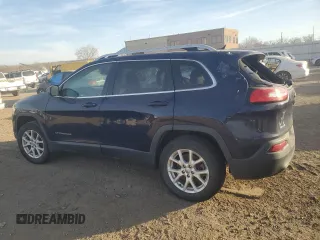 2014 Jeep Cherokee Latitude with VIN 1C4PJMCSXEW260457, listed as a Copart auction lot 76585553 with 84,957 mi miles and Salvage Title. Bid and sale history available at carsss.com. Image 2.