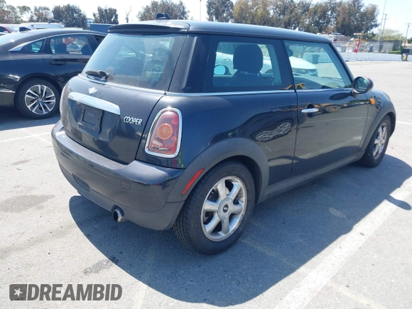 2008 MINI Hardtop with VIN WMWMF33538TT64168, listed as a IAAI auction lot 41976279 with 115,039 mi miles and . Bid and sale history available at DreamBid. Image 4.
