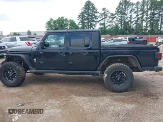 2021 Jeep Gladiator Sport S with VIN 1C6JJTAM7ML554412, listed as a IAAI auction lot 42199167 with 74,263 mi miles and . Bid and sale history available at DreamBid. Image 14.