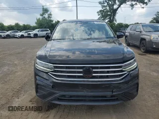 2023 Volkswagen Tiguan S with VIN 3VVFB7AX5PM082907, listed as a Copart auction lot 63643445 with 36,521 mi miles and Salvage title. Bid and sale history available at DreamBid. Image 5.