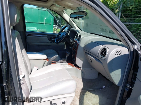2005 GMC Envoy SLE with VIN 1GKDS13S452208252, listed as a IAAI auction lot 42357457 with 197,419 mi miles and . Bid and sale history available at DreamBid. Image 5.