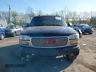 2005 GMC Yukon Denali z VIN 1GKEK63U55J254214, wystawiony jako IAAI lot #42103378 z przebiegiem 131 183 mil mil oraz . Historia ofert i sprzedaży dostępna na DreamBid. Obrazek 11.