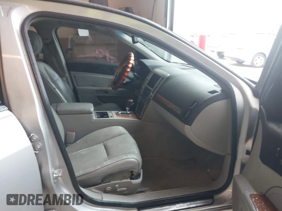 2011 Cadillac STS RWD with VIN 1G6DW6ED4B0120517, listed as a IAAI auction lot 41765069 with 120,059 mi miles and . Bid and sale history available at DreamBid. Image 5.