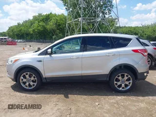 2013 Ford Escape SEL z VIN 1FMCU9H94DUD19842, wystawiony jako IAAI lot #42399577 z przebiegiem 176 257 mil mil oraz . Historia ofert i sprzedaży dostępna na DreamBid. Obrazek 15.