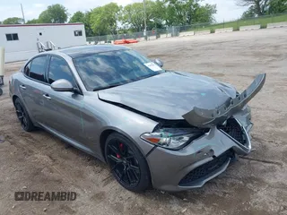 2019 Alfa Romeo Giulia Ti Sport with VIN ZARFANBN3K7601349, listed as a IAAI auction lot 42458259 with 87,327 mi miles and . Bid and sale history available at DreamBid. Image 1.