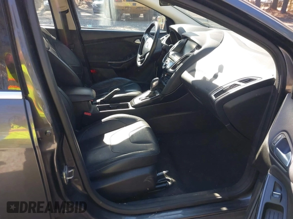 2015 Ford Focus Titanium with VIN 1FADP3J25FL333743, listed as a IAAI auction lot 41857057 with 120,917 mi miles and . Bid and sale history available at carsss.com. Image 5.
