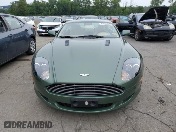2005 Aston Martin DB9 z VIN SCFAD01A95GA02851, wystawiony jako Copart lot #63535783 z przebiegiem 40 729 mil mil oraz . Historia ofert i sprzedaży dostępna na DreamBid. Obrazek 5.