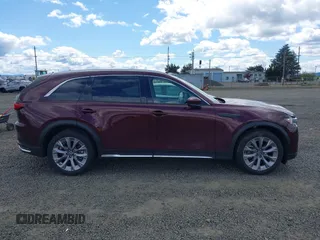 2024 Mazda CX-90 Premium z VIN JM3KKDHD0R1108232, wystawiony jako IAAI lot #42224398 z przebiegiem 3 934 mil mil oraz . Historia ofert i sprzedaży dostępna na DreamBid. Obrazek 14.
