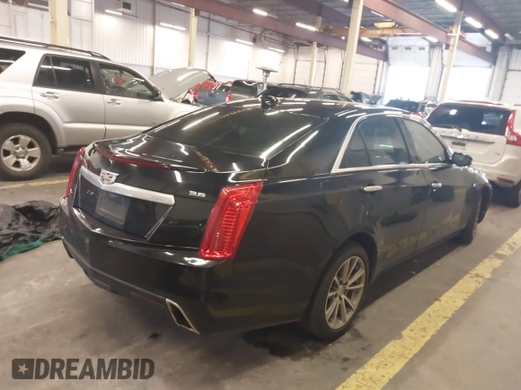 2019 Cadillac CTS Luxury AWD with VIN 1G6AX5SSXK0145788, listed as a IAAI auction lot 40898982 with 92,316 mi miles and . Bid and sale history available at DreamBid. Image 4.
