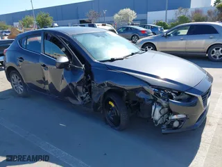 2016 Mazda Mazda3 i Grand Touring with VIN JM1BM1N74G1333699, listed as a IAAI auction lot 41836178 with 194,946 mi miles. Bid and sale history available at carsss.com. Image 1.