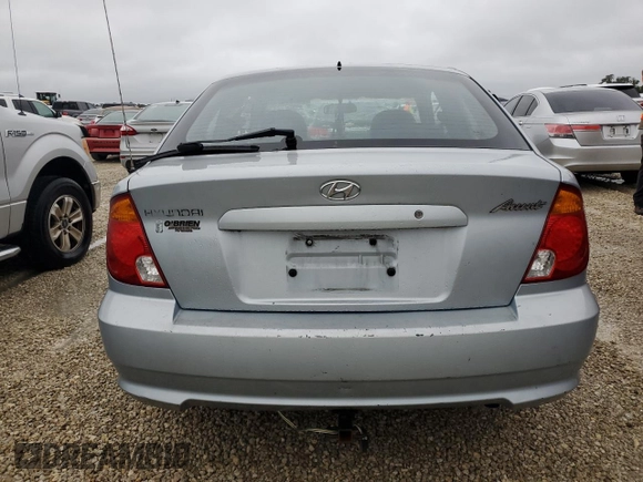 2005 Hyundai Accent GLS with VIN KMHCG35C75U354574, listed as a Copart auction lot 74931444 with 141,013 mi miles and Salvage Title. Bid and sale history available at carsss.com. Image 6.
