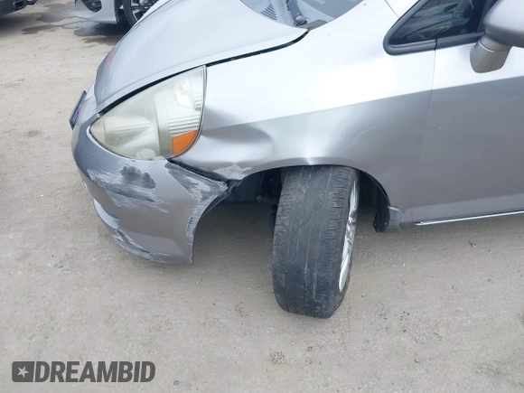 2007 Honda Fit with VIN JHMGD37467S065669, listed as a IAAI auction lot 42078795 with 124,030 mi miles. Bid and sale history available at carsss.com. Image 6.