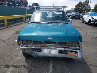 1997 Nissan Frontier XE with VIN 1N6SD11SXVC332100, listed as a Copart auction lot 54330245 with 203,959 mi miles and Salvage title. Bid and sale history available at DreamBid. Image 5.