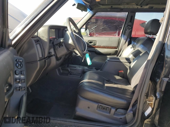 2001 Jeep Cherokee Sport z VIN 1J4FF58S61L612533, wystawiony jako Copart lot #76824714 z przebiegiem 62 401 mil mil oraz Szkoda całkowita • Salvage title. Historia ofert i sprzedaży dostępna na DreamBid. Obrazek 7.