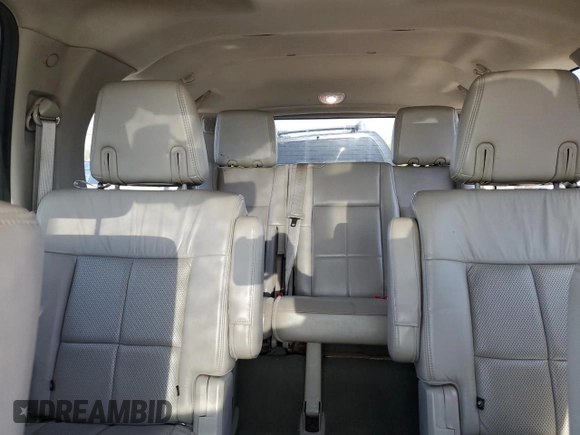 2013 Lincoln Navigator z VIN 5LMJJ3J50DEL03522, wystawiony jako Copart lot #54768335 z przebiegiem 137 326 mil mil oraz Czysty tytuł • Clean title. Historia ofert i sprzedaży dostępna na DreamBid. Obrazek 10.
